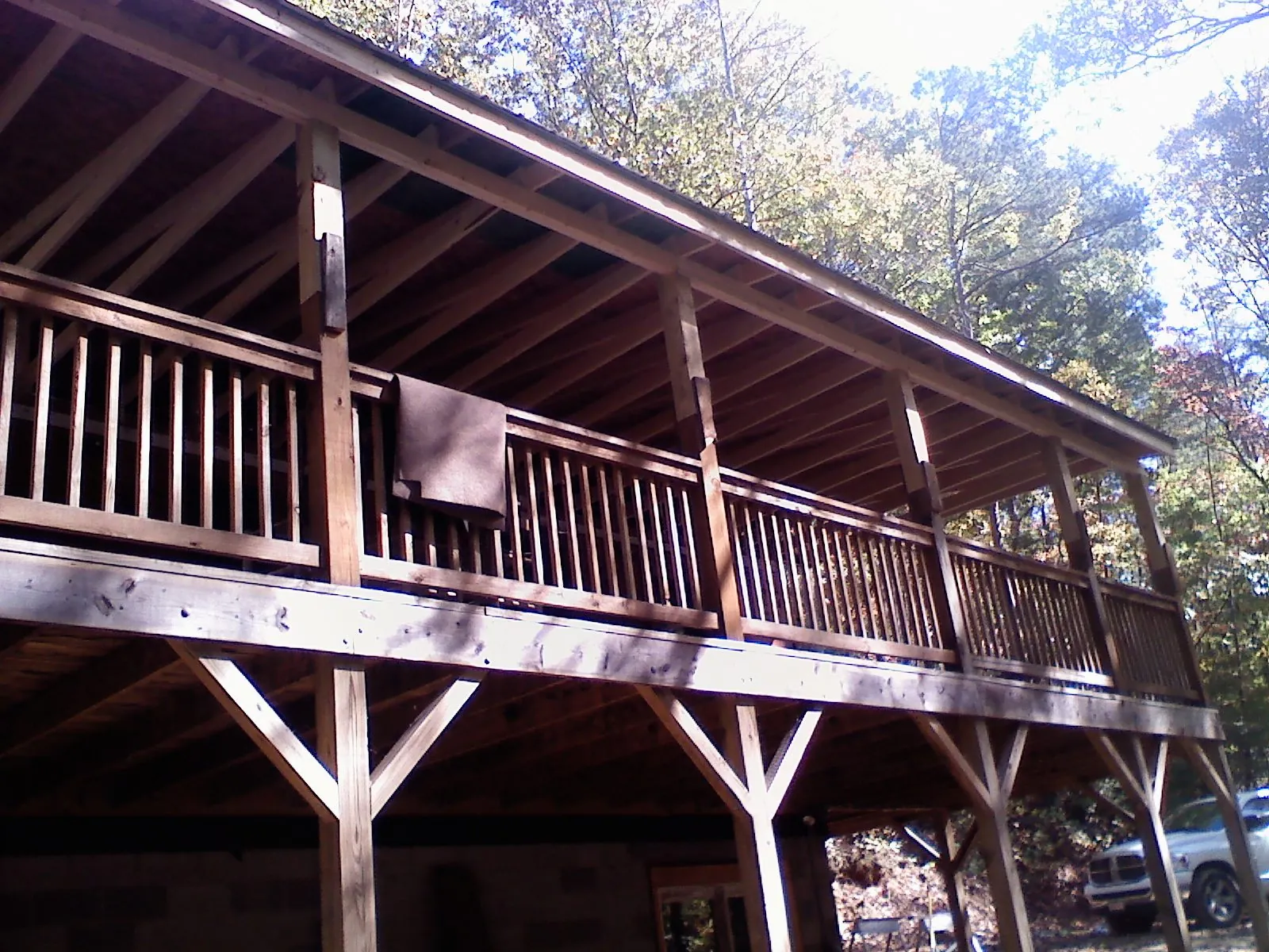 Timber framing under a new elevated porch and deck — Roof Leak Repair in Long Beach by Roofing Brothers